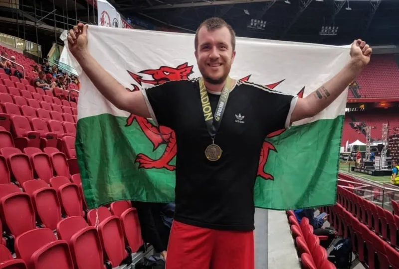 Ben Dudley profile image with Welsh Flag.