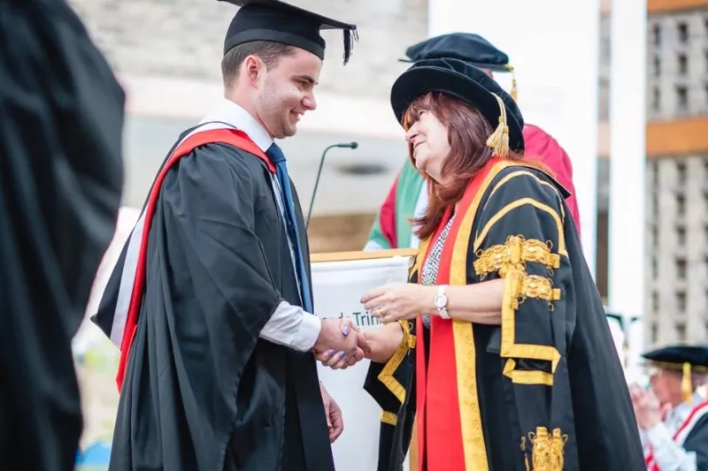 Richard Simpson graduating with Vice Chancellor Professor Margaret House.