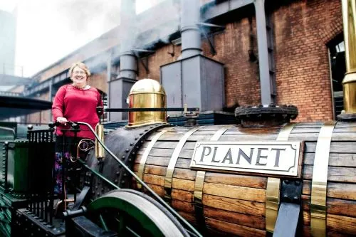 Di Drummond with Planet steam train .