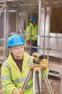 Construction student works on a site